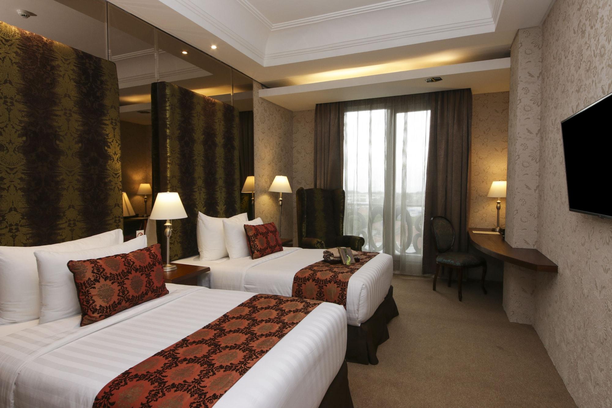 Cinnamon Hotel Boutique Syariah Tutugan Экстерьер фото